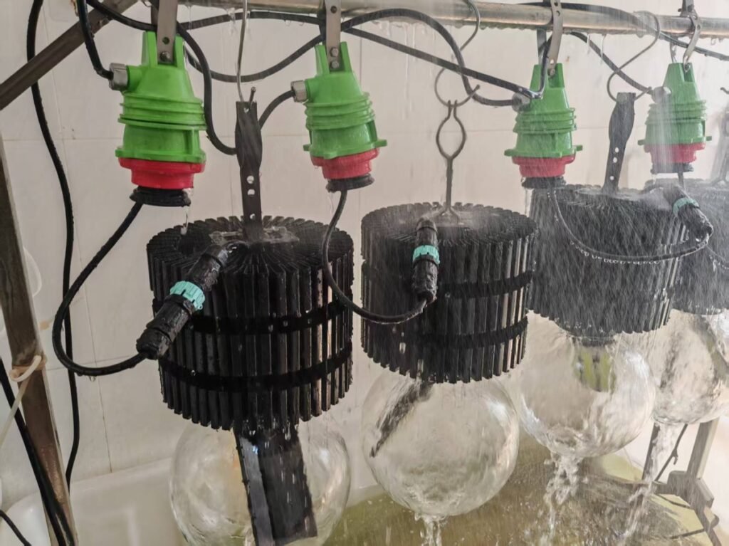 Marine LED fishing lights undergoing a water exposure test above water